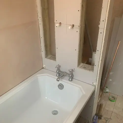 Bath boxing-in during a bathroom renovation