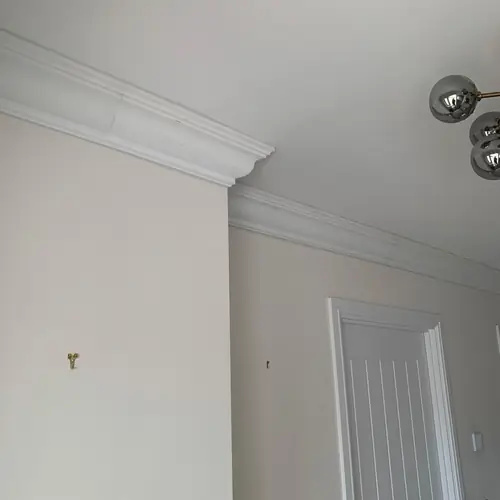 New coving and a cottage-style internal door