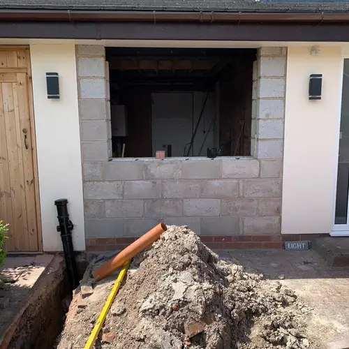 Groundworks and a new rear wall opening for a house extension