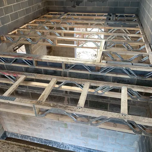Engineered timber floor joists laid inside a new extension