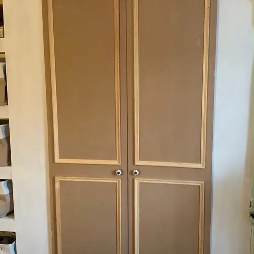 Bespoke fitted wardrobe doors primed ready for painting
