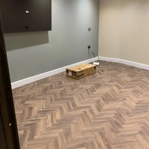 Herringbone wood-effect flooring in a living room