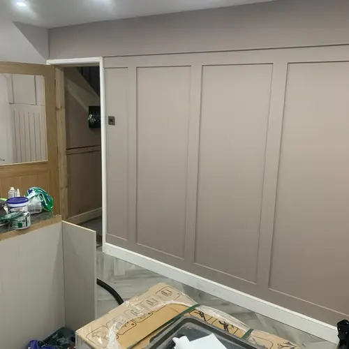 Full-height wall panelling in a kitchen dining area
