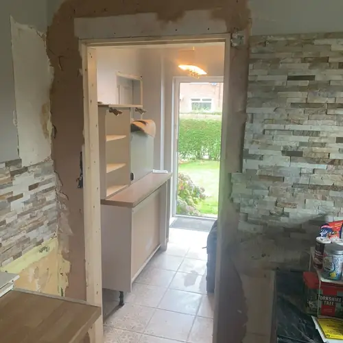 New doorway opening knocked through to a kitchen