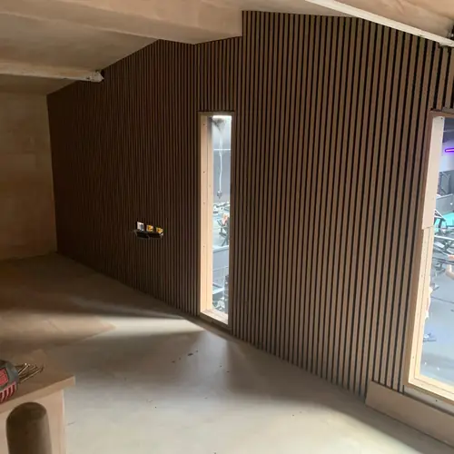 Slatted panel feature wall in a commercial space