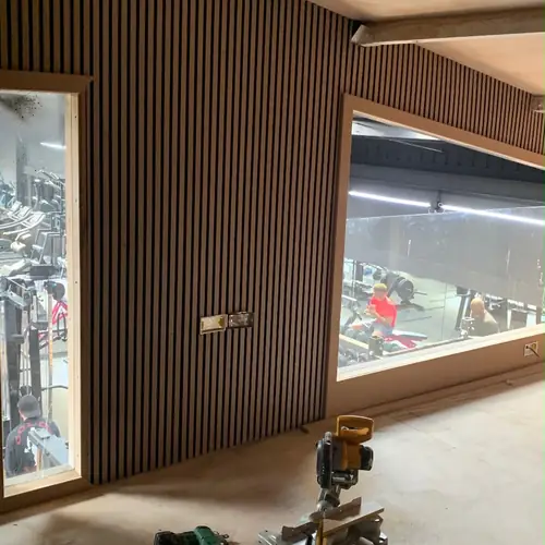 Slatted timber wall panelling in a commercial showroom
