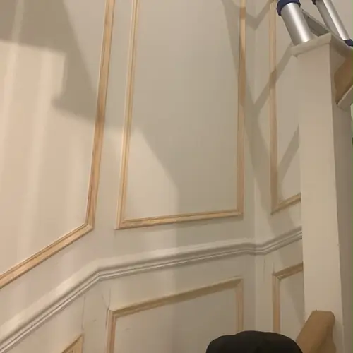 Stairwell panelling part-way through installation
