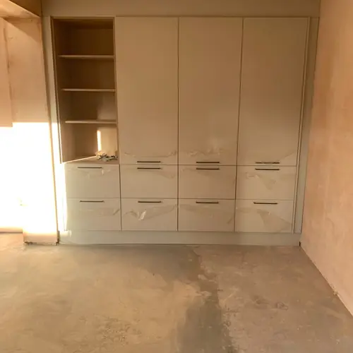 Tall utility room units with open shelving